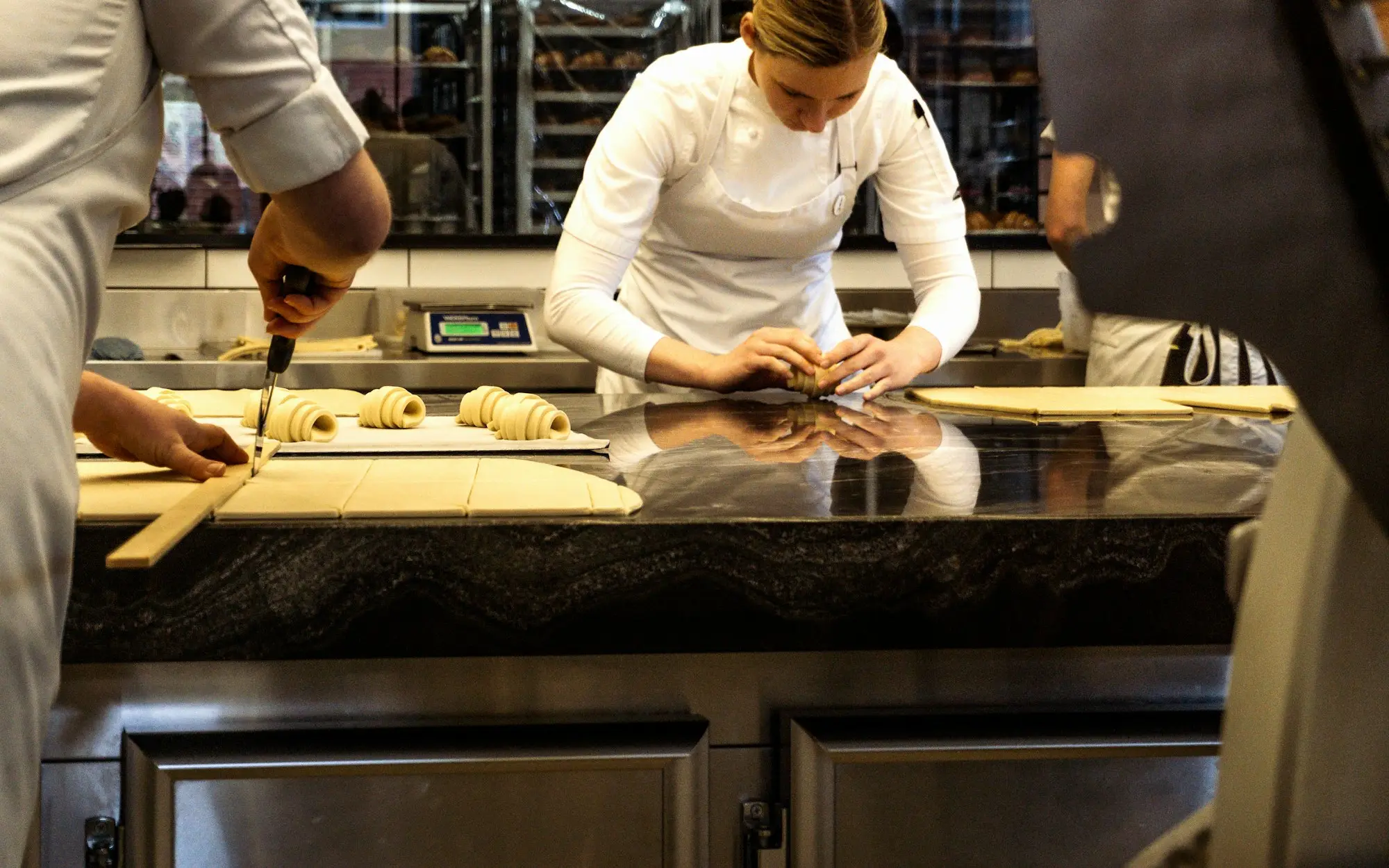Chef working the pass in a Melbourne restaurant kitchen