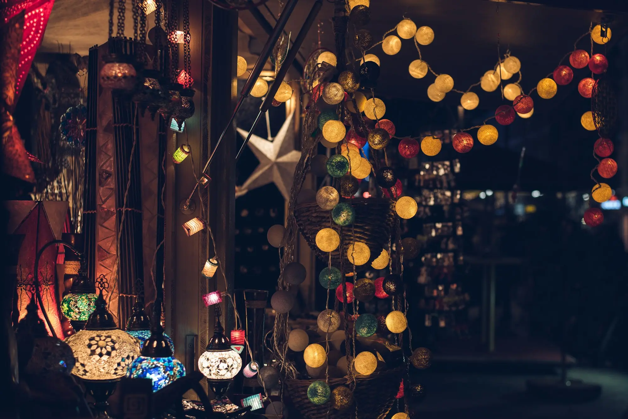 Shop window glowing with festive lights ahead of the Christmas trade